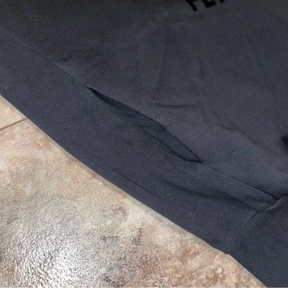 Fear of God Essentials Arch
Logo Hoodie Jet Black Size Small - Picture 5 of 10